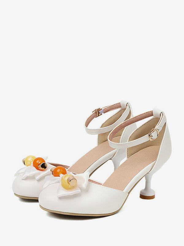 Sweet Lolita bow sandals with round toe and kitten heel, front paired display view showing ecru white PU leather with fruit-bead bow embellishment and ankle buckle strap