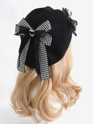 Gothic Lolita black beret with houndstooth bows and heart charm displayed on blonde mannequin rear oblique view showing ribbon bow details and pearl accents