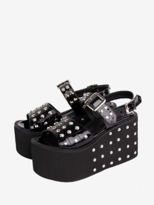 Black Gothic Lolita platform sandals front oblique view, pair display, patent PU upper with silver rivet accents, dual buckle ankle straps, studded thick platform sole, studio white background