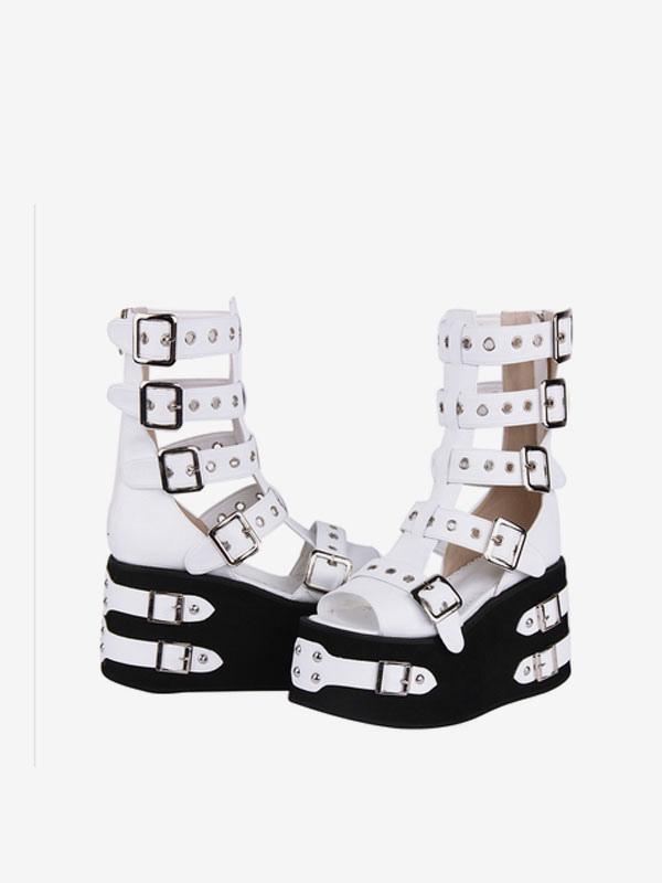 Gothic Lolita gladiator platform sandals side-by-side three-quarter view featuring white PU straps with silver buckles and black thick wedge soles with silver hardware accents