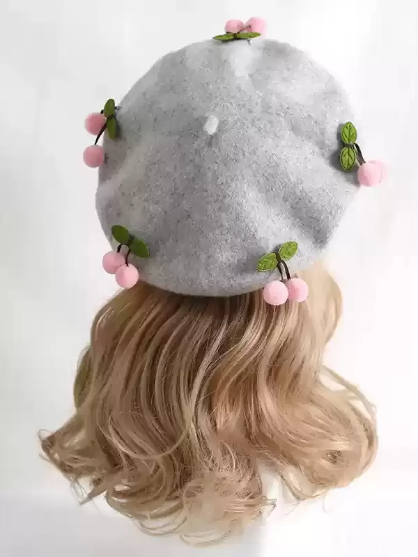 Light gray Sweet Lolita cherry beret featuring red pom-pom ornaments, back view display on mannequin