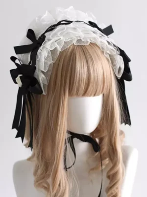 Gothic Lolita headband with black and white color-blocking, ruffled lace trim, and cream rose accents worn on mannequin with light brown wig, front view showcase