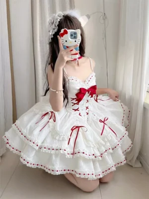 Sweet lolita fairy dress white base red heart neckline tiered ruffled skirt kneeling pose indoor home setting