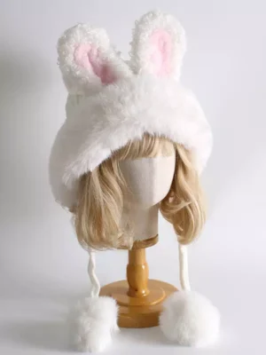 rabbit ear fuzzy lolita winter headdress front medium angle view on blonde wig mannequin with white plush fabric and pink inner ears