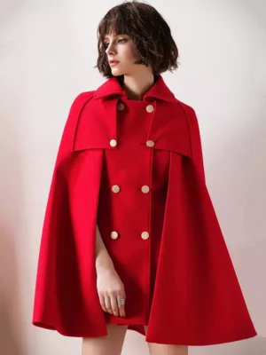 Burgundy wool blend cape cloak with double-breasted gold buttons and turndown collar, front view on short-haired model in studio setting, elegant Ouji lolita winter coat