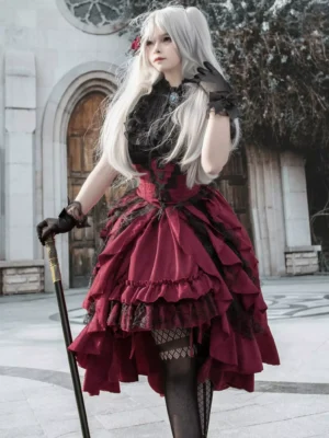 Gothic lolita ensemble featuring black short-sleeve lace blouse and wine-red layered ruffle skirt with asymmetrical hemline, side front angle