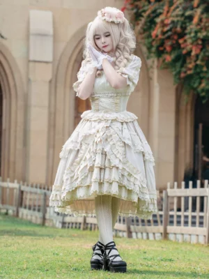 Classic Lolita Hime dress featuring detailed lace-trimmed bodice, corset waist, and voluminous layered skirt with white stockings and black shoes—European garden backdrop