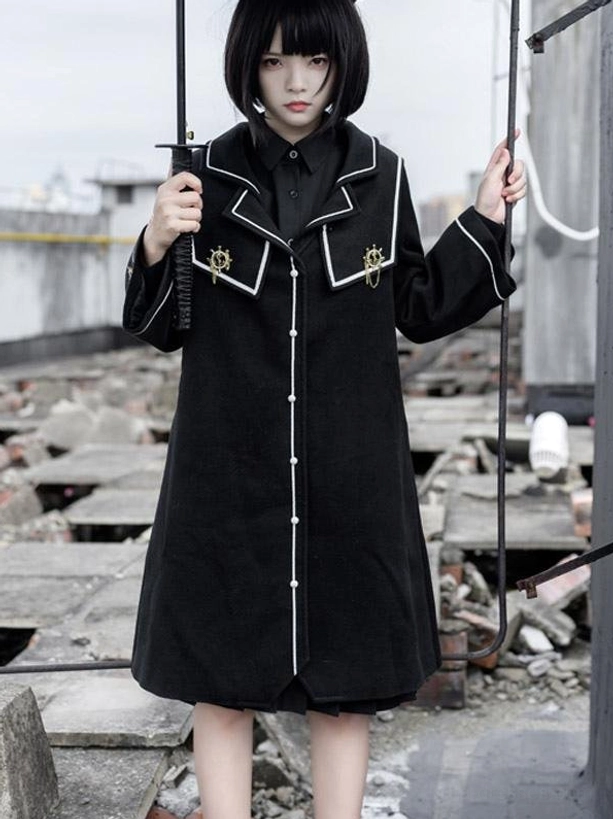 Black lolita long coat front view with pearl button placket white collar cuff trim metal embroidery badges academic style polyester overcoat