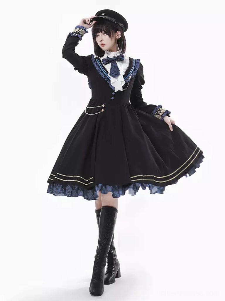 Academic Lolita dress three-quarter front view black plaid blue ruffled hem white lace collar model touching military cap ouji aesthetic styling