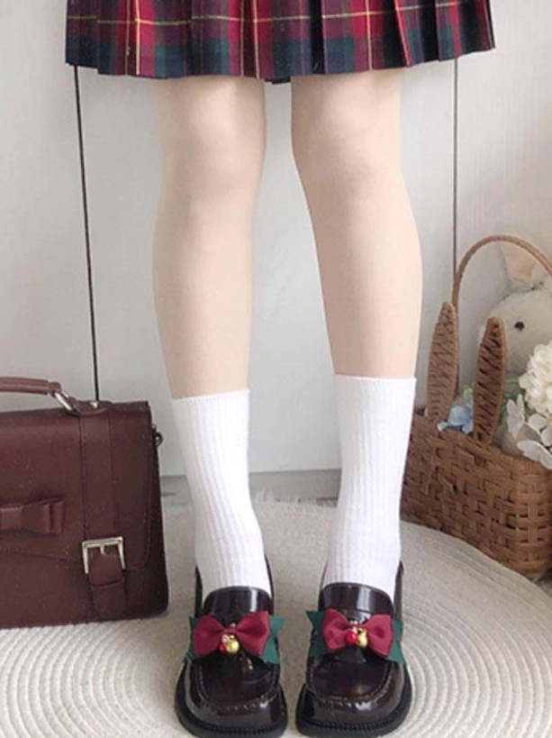 Academic lolita pumps full lower body view worn indoors with vintage leather bag and wicker basket dark brown glossy finish round toe bow ornament