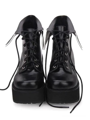All-black smooth leather lace-up platform lolita ankle boots with decorative fold-over collar and metal eyelets, front paired view on white background