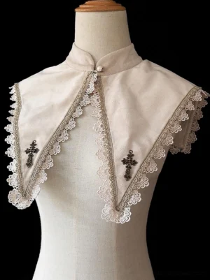 Apricot corduroy lolita cape collar with metal cross ornaments and delicate lace edging close-up front view