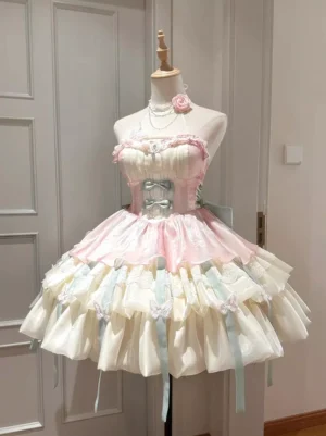 Apricot Fairy Lolita JSK dress front view featuring strapless ruffled bodice with butterfly embellishments, multi-layered tiered tulle skirt with light blue trim accents, displayed on dress form in indoor setting