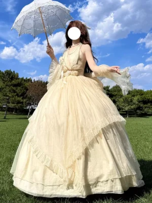 Apricot halter fairy lolita dress with layered ruffled tulle skirt and waist flower decoration, front-left view in outdoor grassland