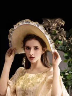 apricot ruffled lace lolita wide brim hat front view light peachy apricot color with delicate lace trim framing brim victorian inspired classic lolita headdress