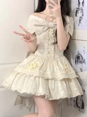 Sweet Lolita dress with textured jacquard fabric, off-shoulder cap sleeves, two-tiered ruffled skirt detail, and halter neck bow shown in front mirror selfie angle