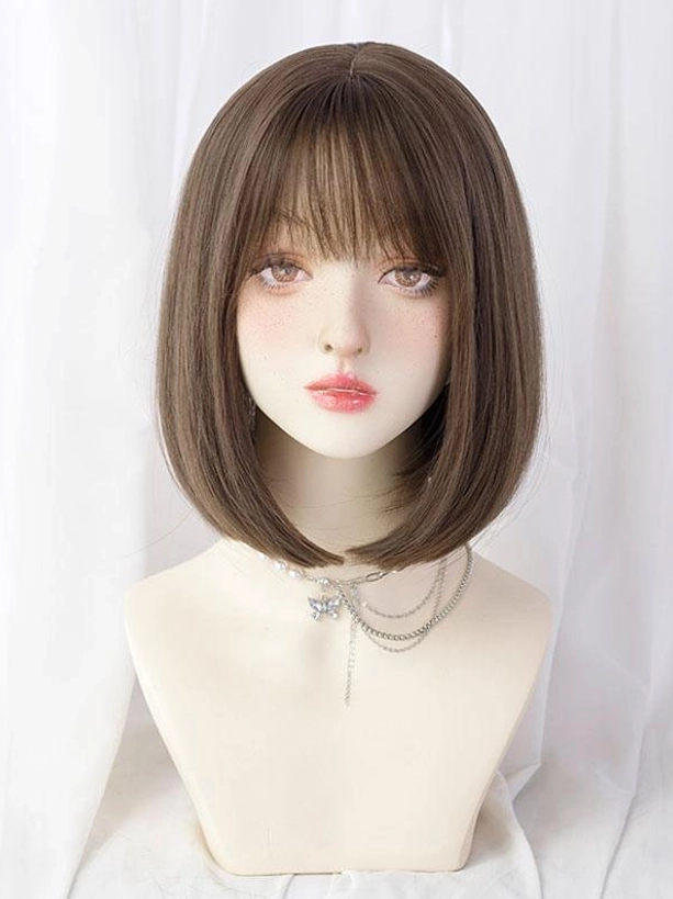 Ash brown short bob lolita wig with layered bangs front view on mannequin bust displaying sweet lolita styling with beaded layered necklace and natural hairline
