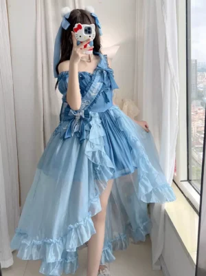 Azure sweet lolita dress with off-shoulder neckline and dramatic ruffled skirt, indoor selfie pose near window showing ruffled layers and bow sash detail