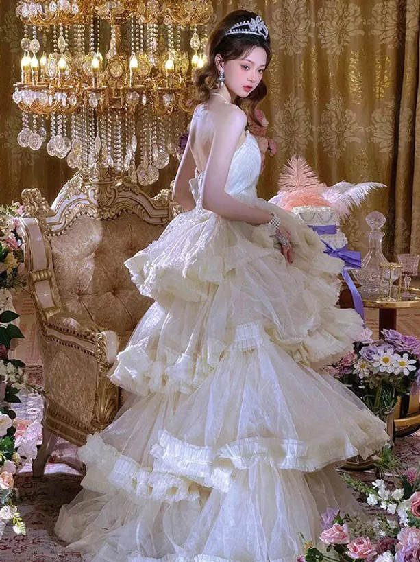 Backless strapless fairy wedding gown white tulle side rear view layered ruffled skirt lace edges sweet lolita european palace scene