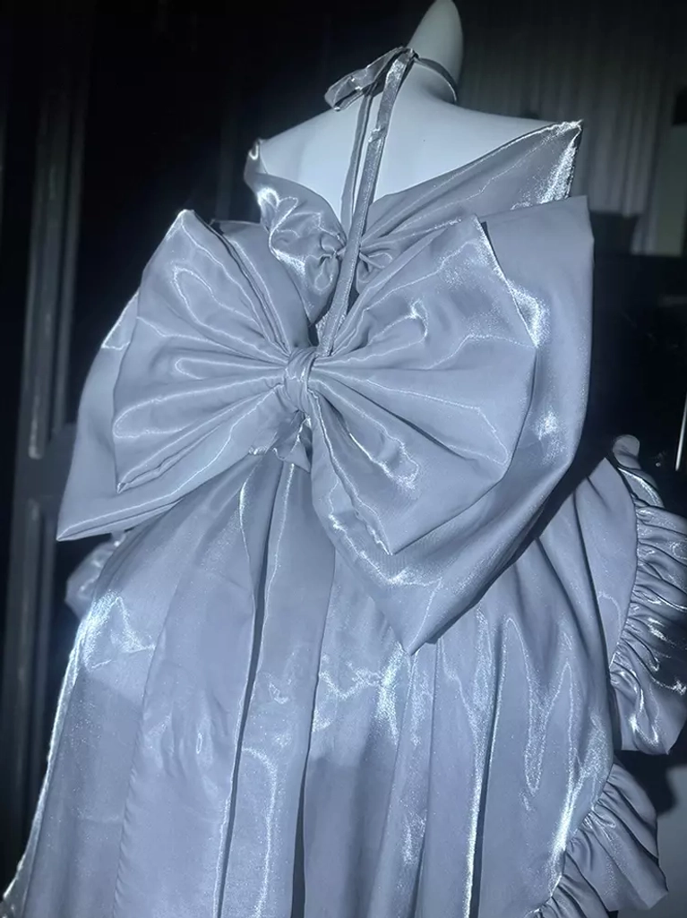 Silver-gray off-shoulder Lolita princess dress with oversized back satin bow halter strap and ruffled sides back view