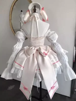 Beige-white ballet lolita dress back view with trailing large bow ruched corset bodice and long puff sleeves on dress form