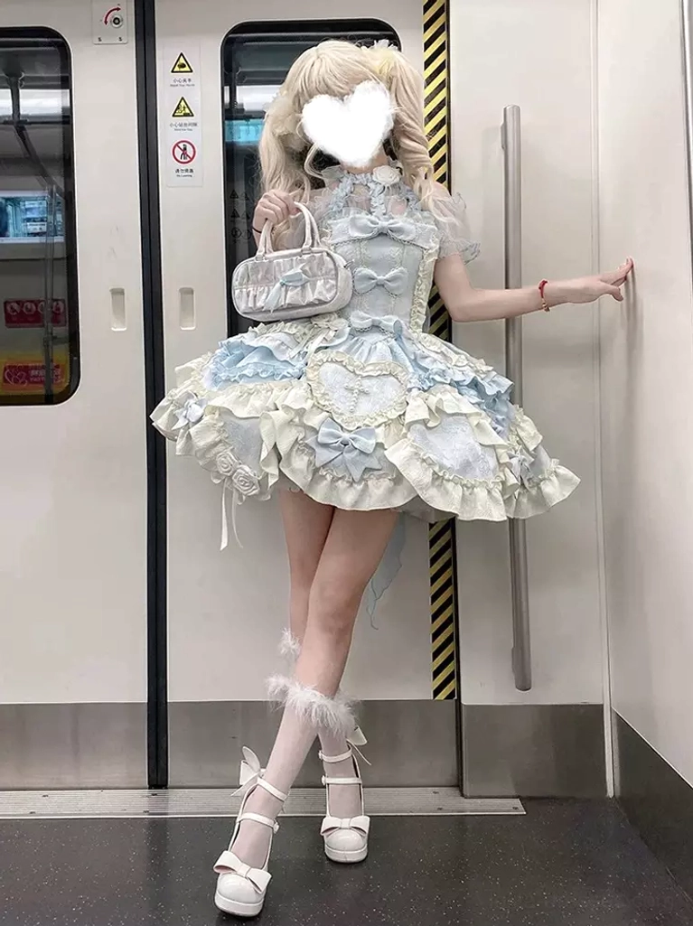 Ballet lolita dress low angle view halter neckline platform heels fluffy leg cuffs ruffled skirt train full silhouette
