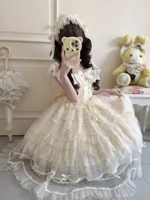 Beige hime lolita fairy ballet dress with tiered tulle overskirt and ruffled shoulder straps front view mirror selfie indoor