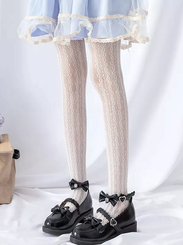 Beige lace mesh lolita tights front three-quarter view blue ruffled skirt black bow mary jane shoes