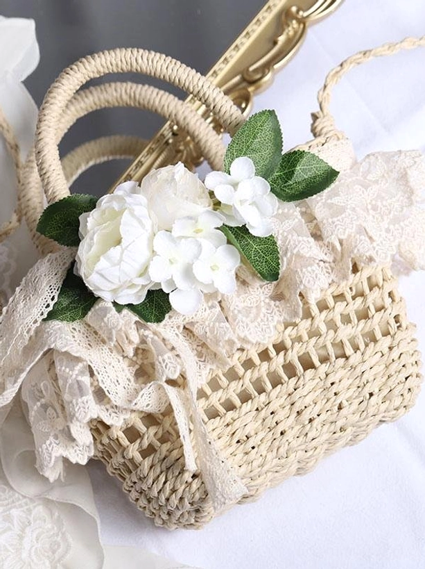 Beige straw lolita handbag side three-quarter view cream lace trim white flower accents rustic charm