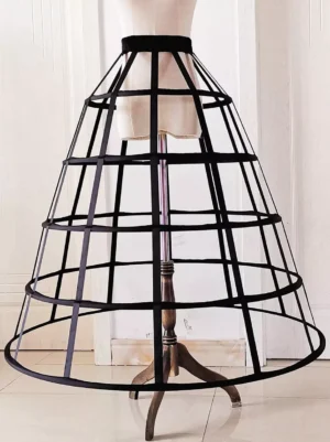 Black birdcage petticoat with steel hoops front full view showing A-line silhouette and hollow-out design on white background