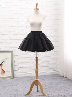 Black boneless lolita petticoat with two-tiered ruffled hem displayed on dress form showing full silhouette and volume