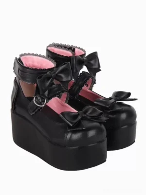 Pair of black butterfly lolita sandals with dual bow designs scalloped ankle trim and waterproof wedge platform