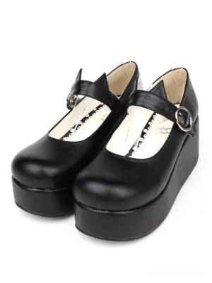 Black cat ear Mary Jane platform shoes with round toe and adjustable ankle buckle strap front flat lay view showing detailed cat ear vamp design and thick wedge sole gothic lolita footwear