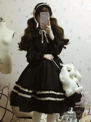 Black Classic Two-Tone Lolita OP One-Piece Dress with Ruffled Lantern Sleeves and Bow Collar Front View on Model
