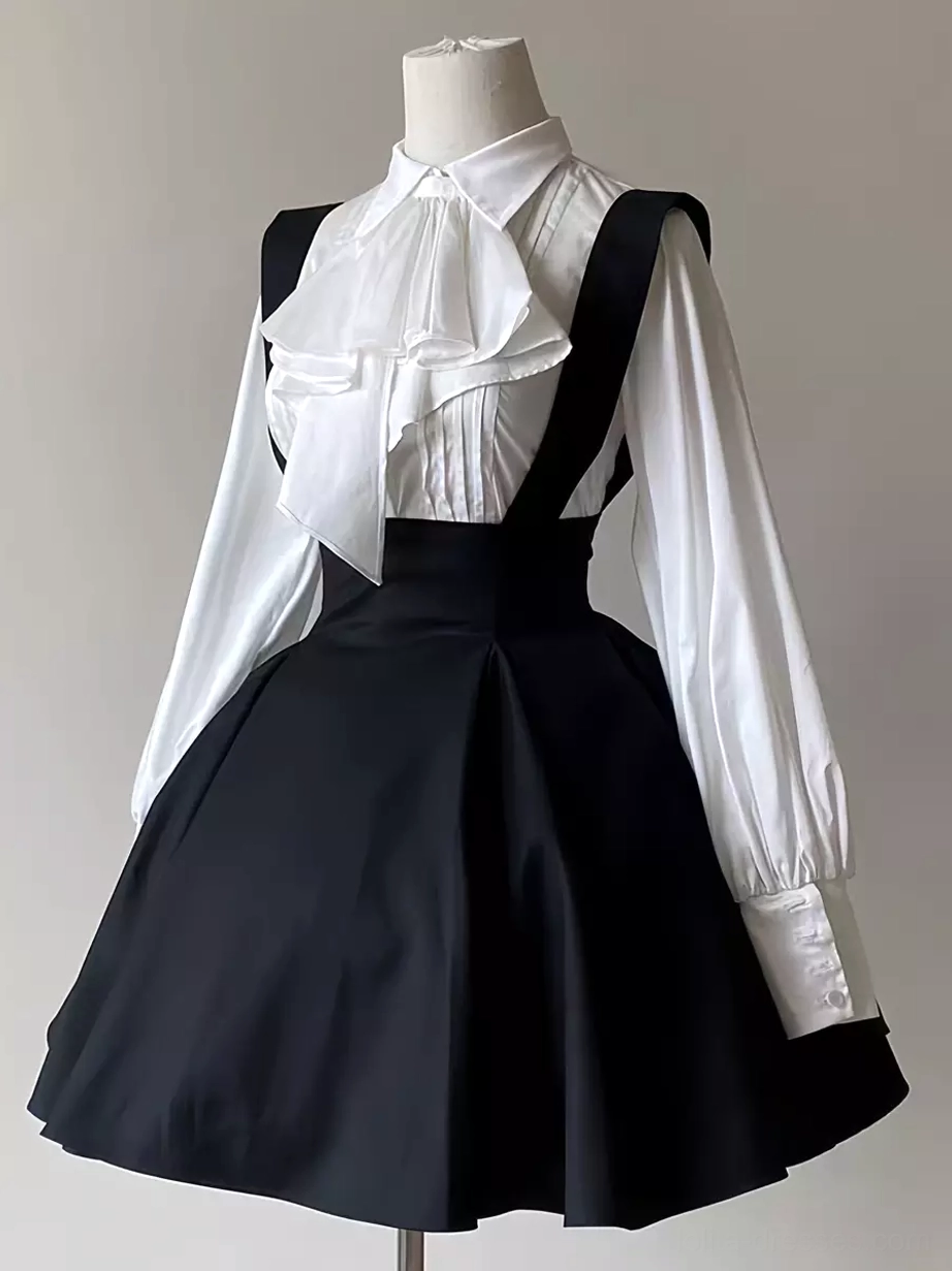 Black classic lolita suspender skirt front view on dress form with high-waisted flare and ruffled neck bow detail