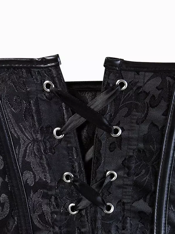 Black corset front lace-up closure with silver metal eyelets and black ribbon lacing romantic detail