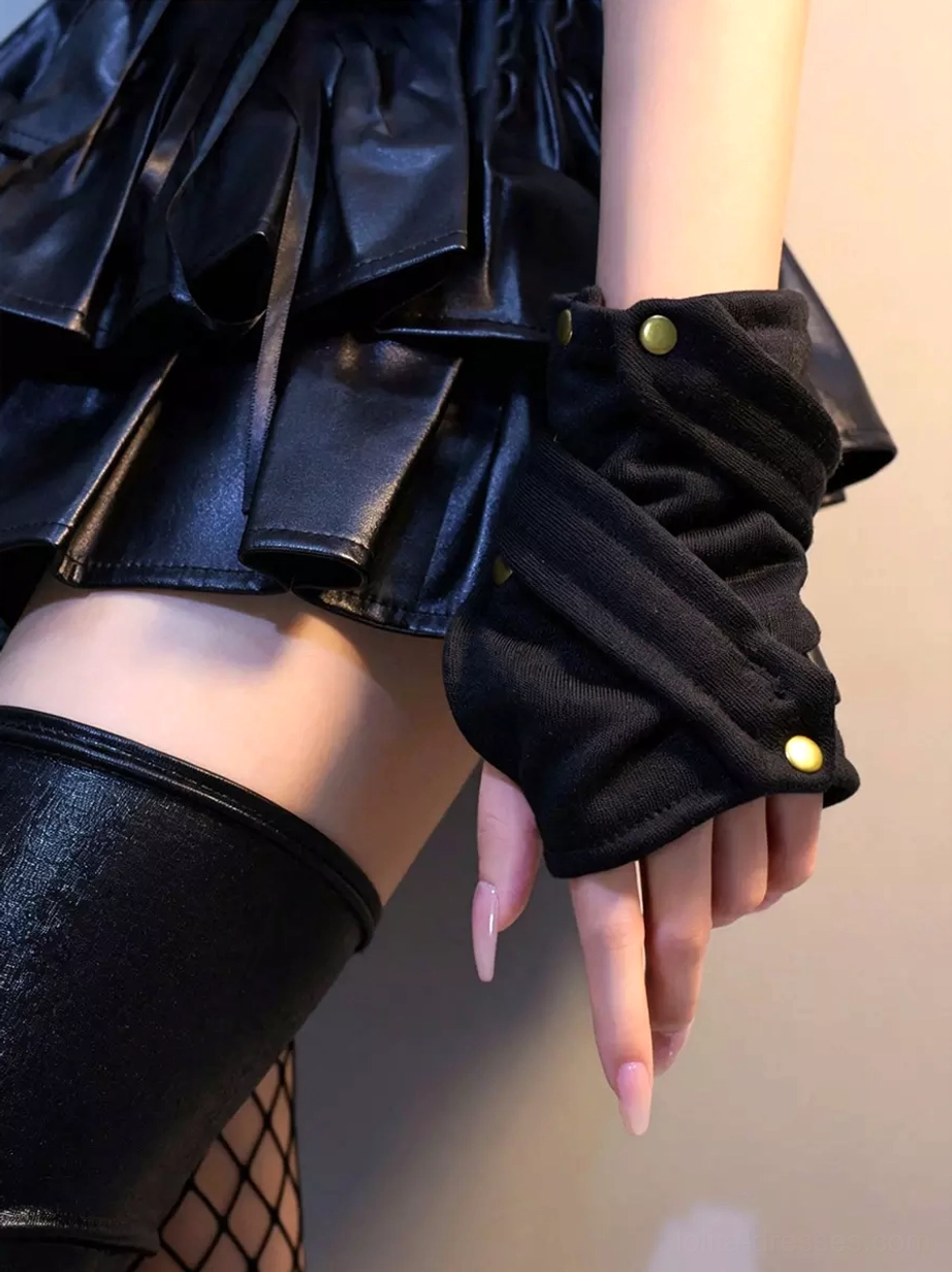 Black fingerless arm warmers with crisscross wrap and brass snap decorations worn on model with black pleather skirt and over-the-knee leather boots, showing gothic lolita styling coordination from oblique side view