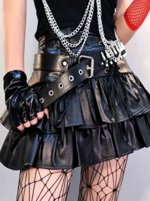 Black faux leather fingerless gloves side view with shiny finish paired with layered leather skirt and chain belt for gothic fashion styling
