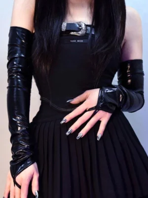 Front view black fingerless oversleeves with finger loop design glossy leather texture belted black dress