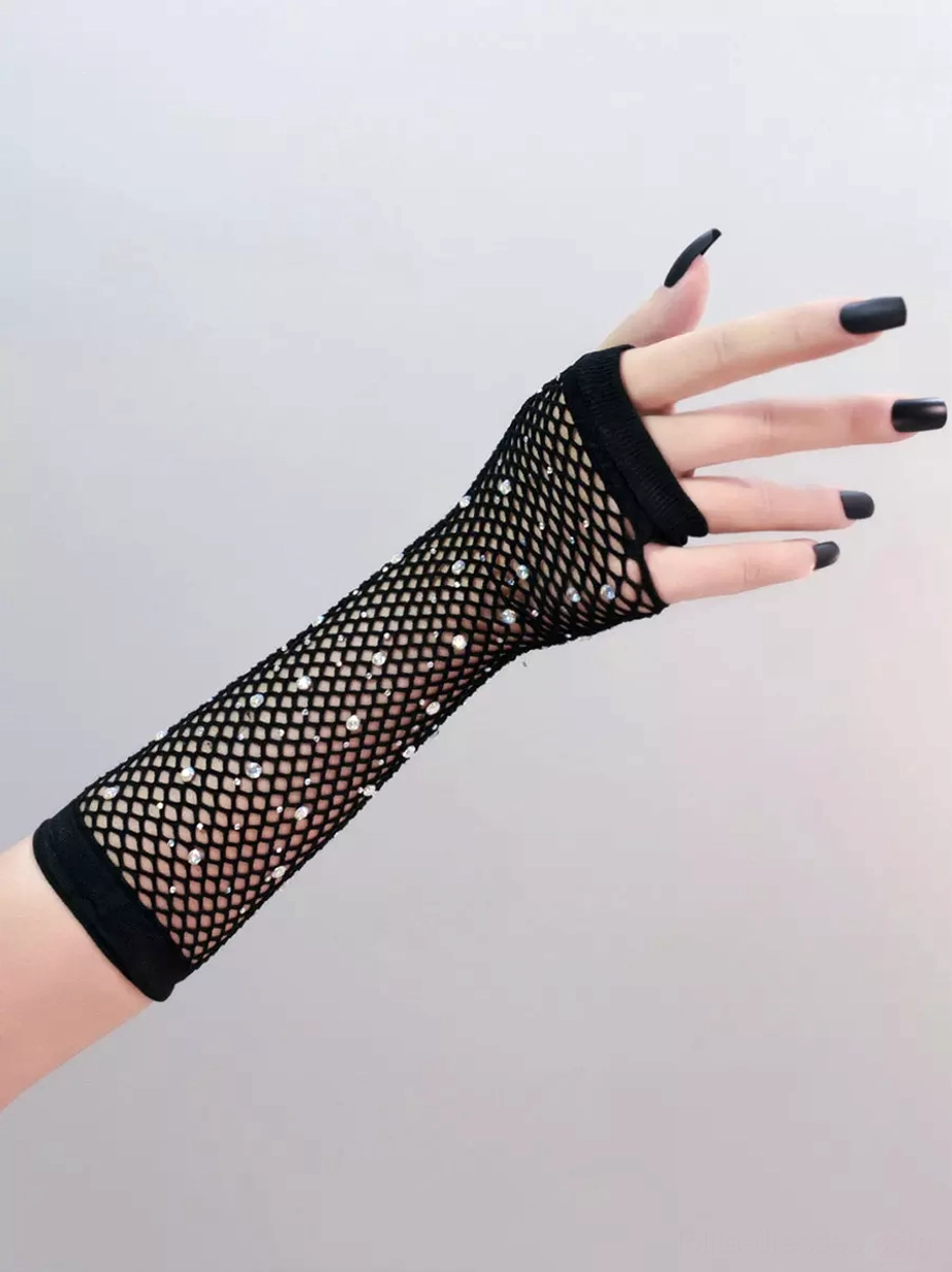 Single black fishnet fingerless glove front close-up showing hand and forearm with dark nail polish on plain light background, demonstrating delicate mesh construction