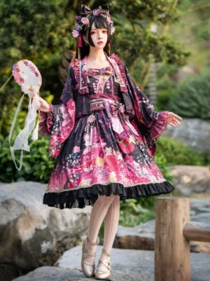 Black floral kimono lolita 3-piece dress set with bowknot and ruffles displayed on girl in outdoor garden setting showing full front view