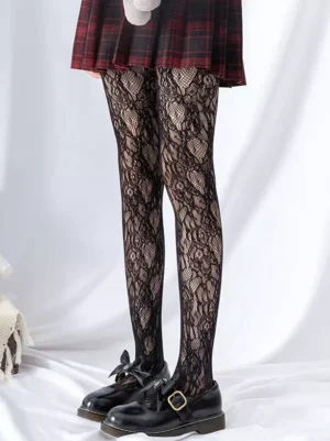 Black floral lace fishnet tights sweet lolita style front full leg view with red plaid skirt and black Mary Jane shoes