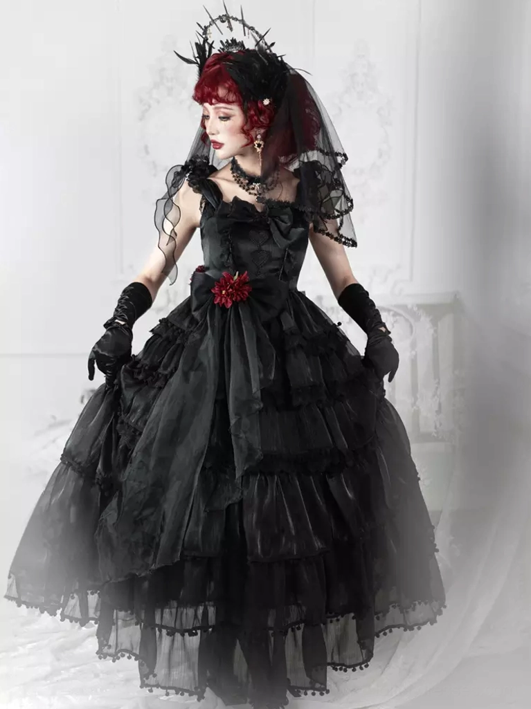 Black gothic bridal lolita dress with tiered ruffled skirt, red flower brooch, long black gloves, dark veil and spiky headpiece