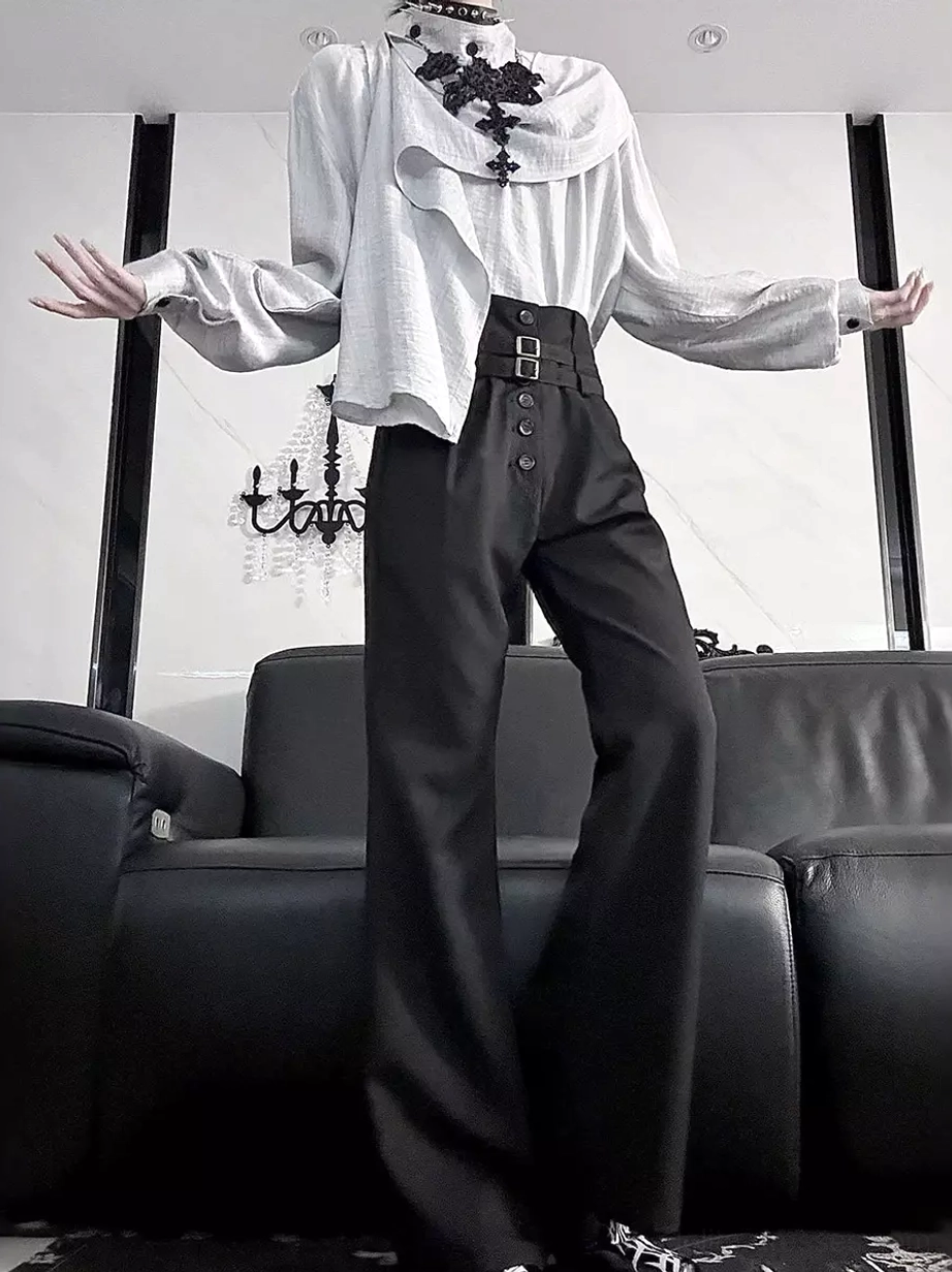 Black gothic high-waist belted flare trousers front three-quarter view with double buckle fastening, styled with ruffled gothic blouse and cross choker for dramatic lolita aesthetic