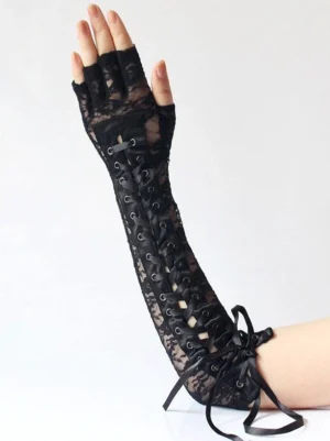 Single black lace fingerless arm warmer displayed on model arm side view showing metal grommets lace-up closure satin bow wrist detail