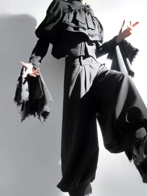 Gothic lolita black bloomers with detachable ruffled scarf and wide-leg trousers dynamic pose