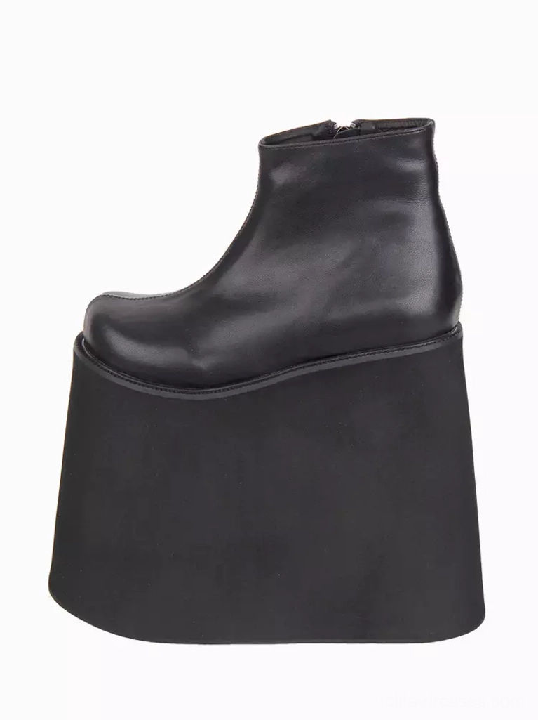 Single black Gothic Lolita boot left side profile revealing thick wedge platform sole, ankle boot shaft height, and round closed toe design