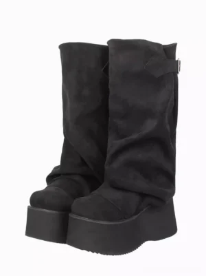 Black slouchy gothic lolita mid-calf boots with adjustable buckle strap - front three-quarter pair view showing corduroy texture, wedge platform heel, and grommet embellishments