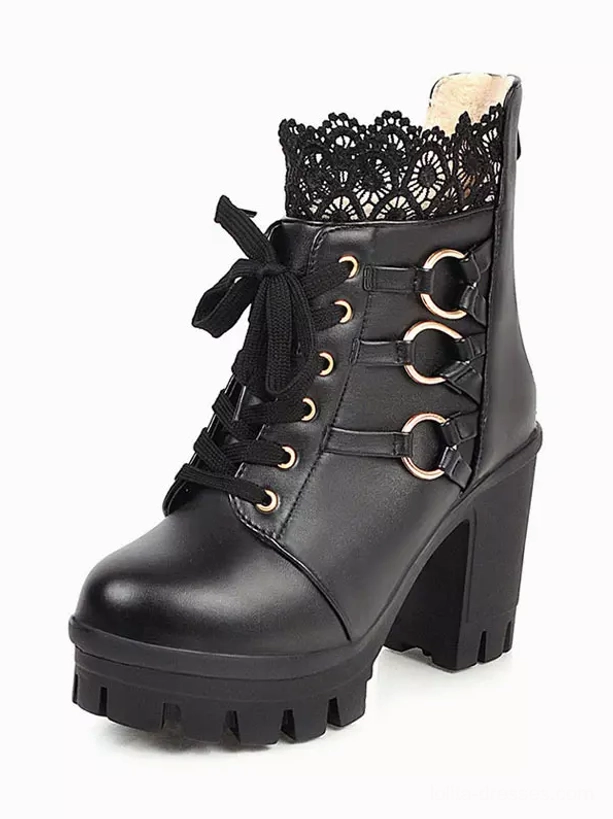 Black lace Gothic lolita chunky heel ankle boots front three-quarter view showing PU leather construction metal ring accents lace collar and lace-up front design