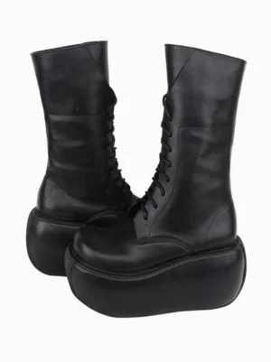Black lace-up platform mid-calf boots rear three-quarter view paired shoes matte PU leather surface high platform sole